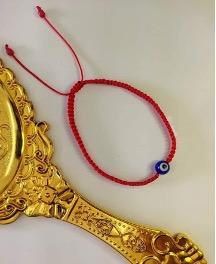 Pulsera de hilo con dije